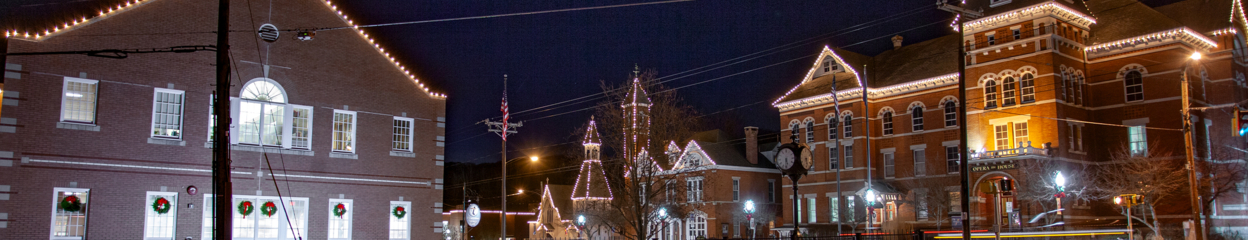 An outdoor night time shot of downtown Thomaston with holiday lights