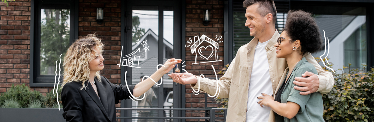 Happy couple taking key for new house from real estate agent