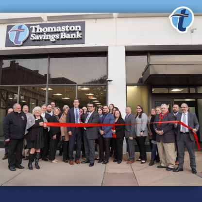 Thomaston Savings Bank employees standing outside of New Britain branch for ribbon cutting