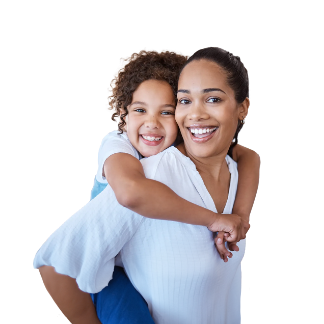 Smiling mother carrying her daughter on her back