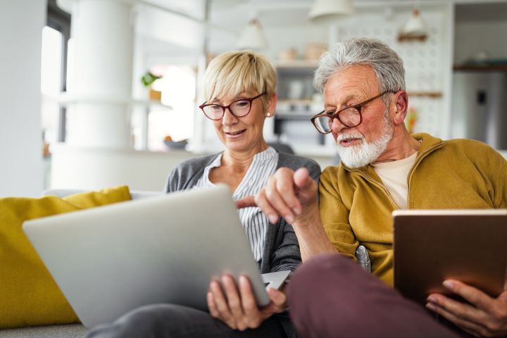 older couple looking at laptop