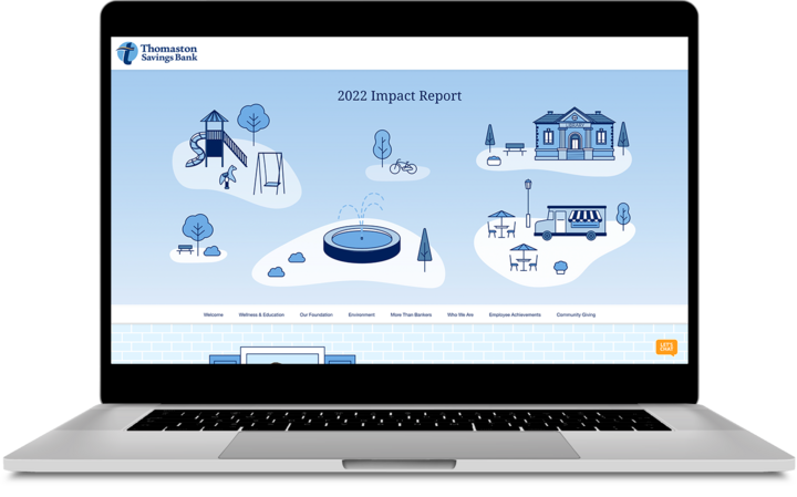 Open laptop screen showing part of the Impact Report website